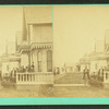 People gathered on the porch of a cottage.