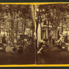 Gathering in front of a cottage.