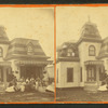 Group gathered in front of a cottage.