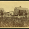 View of the Hermit (Fred Parker?) in front of his house.