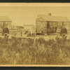 View of the Hermit (Fred Parker?) in front of his house.