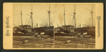 Wharves showing ships moored.