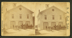 Fire station, steam pumper out front.
