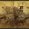 Debris and damaged buildings from explosion.