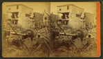 Debris and damaged buildings from explosion.