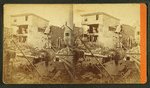 Debris and damaged buildings from explosion.