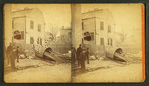 Debris and damaged buildings from explosion.
