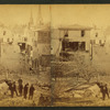 Debris and damaged buildings from explosion.