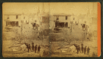 Debris and damaged buildings from explosion.