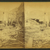 Debris and damaged buildings from explosion.