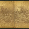 Debris and damaged buildings from explosion.