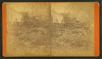 Debris and damaged buildings from explosion.