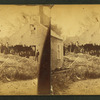 Debris and damaged buildings from explosion.