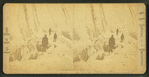 Winter scene showing ice men on the deck of a ship with ice covering the rigging.