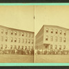 C.T. Sampson's shoe factory with employees out front.