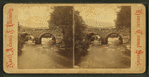 View of a stone arch bridge.