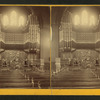 View of a large organ over the altar of a church.