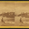 People on the rocks and in a boat at Salem Neck.