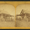 Group on the porch of a cottage.