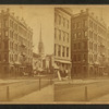 View of a commercial street, including a church.