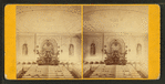 Interior of Universalist church with altar decorated with garlands.