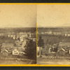 General view of  Winchendon, stone fence in foreground.