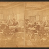 View of engineers on the project at work in their office.