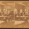 View of engineers on the project at work in their office.