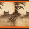 View of an unidentified building, horse and buggy in front.