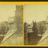 View of unidentified street from an upper window.