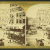 View of unidentified street with commerical businesses with bunting and flags, and wagon and trolley traffic.