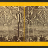View of audience filling the coliseum.