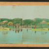 Colorized view of two people in a boat on the pond.