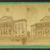 State House decorated with flags.