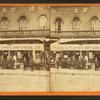 Geo. A. Plummer Dry goods store showing men in front and goods visible.