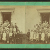 View of unidentified students and teachers.