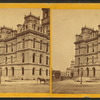 A part of city hall with old city hall in the background.