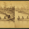 Four Indian men in a boat on Ponca creek.