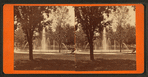 View of the fountain from the shadow of a burr oak.