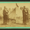 Portrait of a Sioux (Dakota) woman named Wenona among a group of teepees.