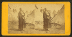 Portrait of a Sioux (Dakota) woman in front of teepees.