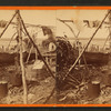 The picturesque of Ste. Marie River, canoe building.