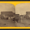 Marquette [Street view showing buisnesses.]