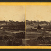 Marquette Harbor showing ore cars on pier.