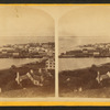 View of the town of Mackinac Island including general view showing piers.