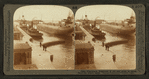 Whaleback freighters of ore and grain in canal, Sault St. Marie, Mich.