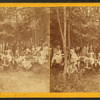 Group portrait among the trees.