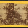 Group of people on the bank of the St. Croix river.