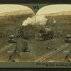 Steam shovel at work, showing how track is laid, Burt mine, Mesabi range, Minn. U.S.A.