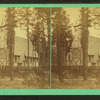 View of a church in the woods.
